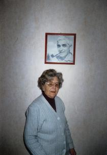 Adela Nissimova Levi with her late husband's portrait