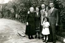 Judita Bruck with her parents, Matija and Magda Bruck, and other family members in their garden